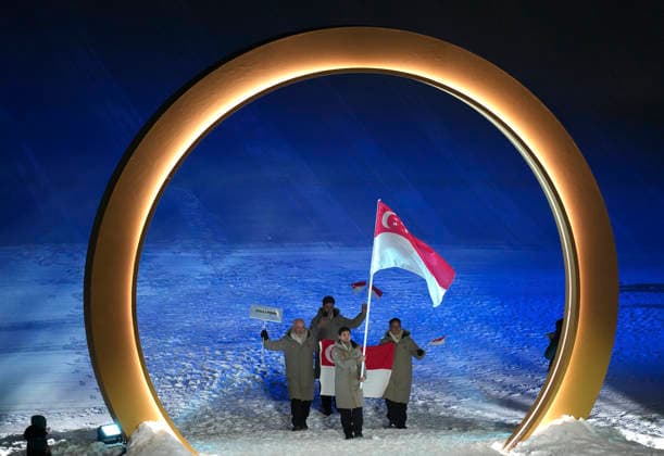 (260207) -- LIVIGNO, Feb. 7, 2026 -- Members of the delegation of Singapore attend the parade of athletes during the opening ceremony of the Milan-Cortina 2026 Olympic Winter games, Winterspiele,Spiele, Summer games in Livigno, Italy, Feb. 6, 2026. ) (MICO2026)ITALY-MILAN-CORTINA 2026-OLYMPIC WINTER GAMES-OPENING CEREMONY XiaxYifang 