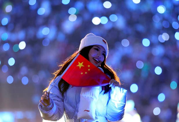 (260207) -- MILAN, Feb. 7, 2026 -- A member of the delegation of China parades into the San Siro Olympic Stadium during the opening ceremony of the Milan-Cortina 2026 Olympic Winter games, Winterspiele,Spiele, Summer games in Milan, Italy, Feb. 6, 2026. ) (MICO2026)ITALY-MILAN-CORTINA 2026-OLYMPIC WINTER GAMES-OPENING CEREMONY LixMing 