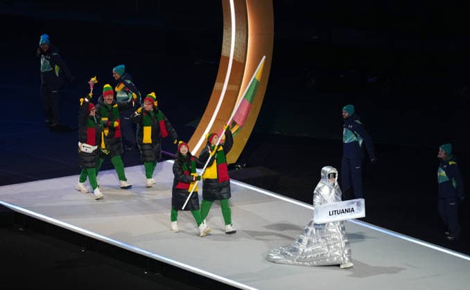 (260207) -- MILAN, Feb. 7, 2026 -- The delegation of Lithuania parades into the San Siro Olympic Stadium during the opening ceremony of the Milan-Cortina 2026 Olympic Winter games, Winterspiele,Spiele, Summer games in Milan, Italy, Feb. 6, 2026. ) (MICO2026)ITALY-MILAN-CORTINA 2026-OLYMPIC WINTER GAMES-OPENING CEREMONY XuexYuge 