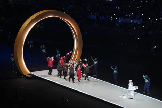 (260207) -- MILAN, Feb. 7, 2026 -- The delegation of Austria parades into the San Siro Olympic Stadium during the opening ceremony of the Milan-Cortina 2026 Olympic Winter games, Winterspiele,Spiele, Summer games in Milan, Italy, Feb. 6, 2026. ) (MICO2026)ITALY-MILAN-CORTINA 2026-OLYMPIC WINTER GAMES-OPENING CEREMONY XuexYuge 