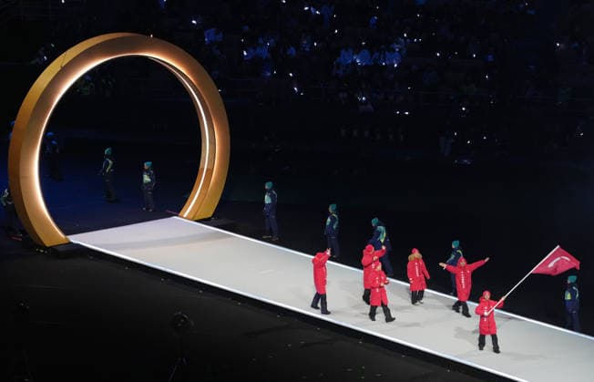 (260207) -- MILAN, Feb. 7, 2026 -- The delegation of T¨¹rkiye parades into the San Siro Olympic Stadium during the opening ceremony of the Milan-Cortina 2026 Olympic Winter games, Winterspiele,Spiele, Summer games in Milan, Italy, Feb. 6, 2026. ) (MICO2026)ITALY-MILAN-CORTINA 2026-OLYMPIC WINTER GAMES-OPENING CEREMONY XuexYuge 