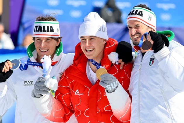 OLYMPICS - Winter Olympic Games, Olympische Spiele, Olympia, OS Milano Cortina 2026 BORMIO,ITALY,07.FEB.26 - OLYMPICS, ALPINE SKIING - Winter Olympic Games Milano Cortina 2026, downhill, men, medal ceremony. Image shows the rejoicing of Giovanni Franzoni (ITA), Franjo von Allmen (SUI) and Dominik Paris (ITA). Keywords: medal.  GEPAxpictures xWolfgangxGrebien