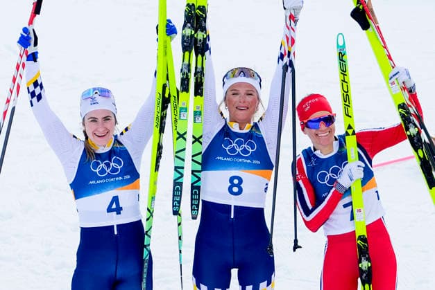 Winter Olympics in Milan Cortina 2026 Val di Fiemme, Italy 20260207. Ebba Andersson from Sweden, Frida Karlsson from Sweden and Heidi Weng from Norway cheer during the women s cross-country 20 km Skiathlon at Lago di Tesero during the Milan Cortina 2026 Winter Olympics. Photo: Lise Aserud NTB Val di Fiemme Italy EDITORIAL USE ONLY. RESTRICTED USE FOR BETTING COMPANIES Ref:_SPOiSnCYNhLvMo.jpg *** Winter Olympics in Milan Cortina 2026 Val di Fiemme, Italy 20260207 Ebba Andersson from Sweden, Frida Karlsson from Sweden and Heidi Weng from Norway cheer during the women s cross country 20 km Skiathlon at Lago di Tesero during the Milan Cortina 2026 Winter Olympics Photo Lise Aserud NTB Val di Fiemme Italy EDITORIAL USE ONLY RESTRICTED USE FOR BETTING COMPANIES  Copyright: xLisexAserudx xNTBx