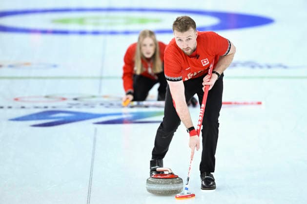 (260207) -- CORTINA D AMPEZZO, Feb. 7, 2026 -- Yannick Schwaller of Switzerland competes during the curling mixed doubles round robin session 7 match between Switzerland and Sweden of the 2026 Milan-Cortina Winter Olympics in Cortina D Ampezzo, Italy, Feb. 7, 2026. ) (MICO2026)ITALY-CORTINA D AMPEZZO-OLYMPIC Winter games, Winterspiele,Spiele, Summer games CURLING-MIXED DOUBLES-ROUND ROBIN LianxYi 