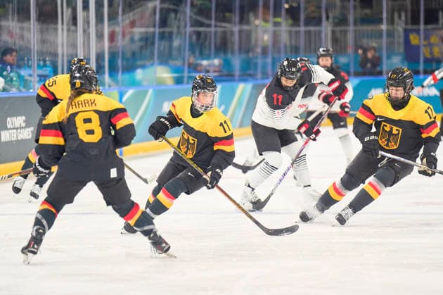 Nicola Hadraschek- Eisenschmid of Germany Emily Nix of Germany compete and fight for the puck against at the preliminary women Ice hockey, Eishockey match Group B Germany-Japan of the Milano Cortina 2026 Winter Olympic Games, Olympische Spiele, Olympia, OS at Milano Rho Ice Hockey Arena on February 7, 2026 in Milan, Italy.
