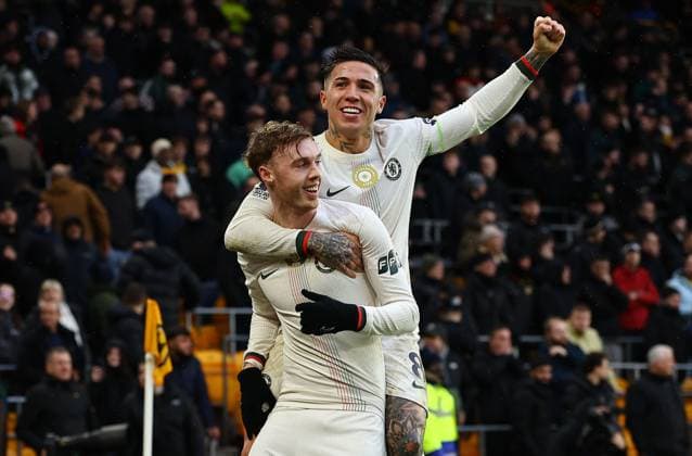 Cole Palmer of Chelsea celebrates scoring their sides third goal with team-mate Enzo Fernandez of Chelsea Wolverhampton Wanderers v Chelsea, Premier League, Football, Molineux, Wolverhampton, UK - 07 Feb 2026Wolverhampton Molineux United Kingdom EDITORIAL USE ONLY No use with unauthorised audio, video, data, fixture lists, club league logos or live services. Online in-match use limited to 120 images, no video emulation. No use in betting, games or single club league player publications. Copyright: xMichaelxZemanek Shutterstockx 16524375ab