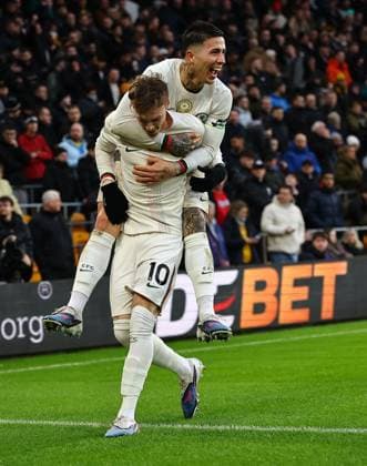 Cole Palmer of Chelsea celebrates scoring their sides third goal with team-mate Enzo Fernandez of Chelsea Wolverhampton Wanderers v Chelsea, Premier League, Football, Molineux, Wolverhampton, UK - 07 Feb 2026Wolverhampton Molineux United Kingdom EDITORIAL USE ONLY No use with unauthorised audio, video, data, fixture lists, club league logos or live services. Online in-match use limited to 120 images, no video emulation. No use in betting, games or single club league player publications. Copyright: xMichaelxZemanek Shutterstockx 16524375ac