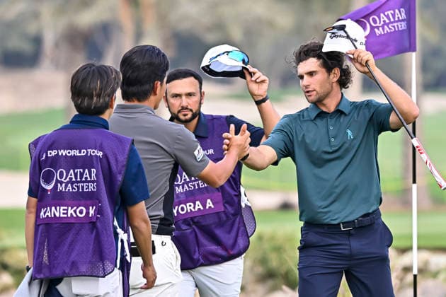 QATAR MASTERS 2026- THIRD ROUND Angel Ayora of Spain and Kota Kaneko of Japan shake hands on the 18th hole after finishing their third round of the Qatar Masters 2026 golf tournament at the Doha Golf Club in Doha, Qatar, on February 7, 2026 DOHA Qatar Copyright: xNOUSHADx
