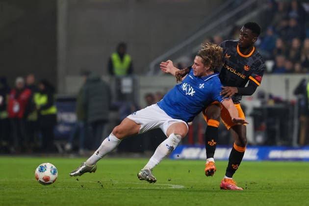 FBL Germany 2 Bundesliga SV Darmstadt 98 1 FC Kaiserslautern Fynn Luca Lakenmacher SV Darmstadt 98 , Maxwell Gyamfi 1 FC Kaiserslautern battles for the Ball during the 2 Bundesliga 2025 26 match between SV Darmstadt 98 and 1 FC Kaiserslautern at Merckstadion am Böllenfalltor on 7 February 2026 in Darmstadt, Germany DFL DFB REGULATIONS PROHIBIT ANY USE OF PHOTOGRAPHS as IMAGE SEQUENCES and or QUASI VIDEO Copyright: JoaquimxFerreira