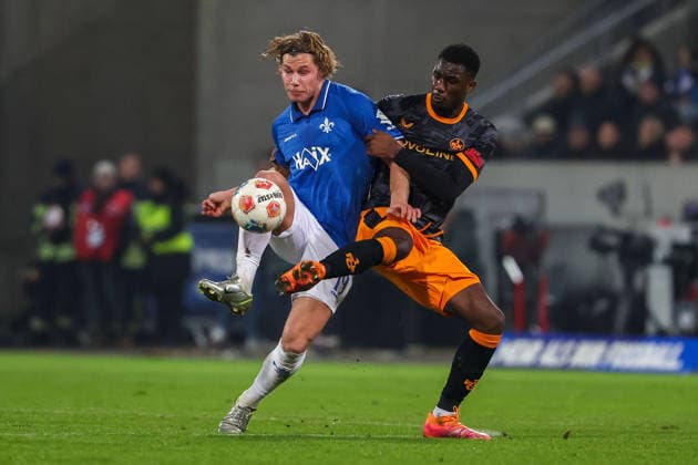 FBL Germany 2 Bundesliga SV Darmstadt 98 1 FC Kaiserslautern Fynn Luca Lakenmacher SV Darmstadt 98 , Maxwell Gyamfi 1 FC Kaiserslautern battles for the Ball during the 2 Bundesliga 2025 26 match between SV Darmstadt 98 and 1 FC Kaiserslautern at Merckstadion am Böllenfalltor on 7 February 2026 in Darmstadt, Germany DFL DFB REGULATIONS PROHIBIT ANY USE OF PHOTOGRAPHS as IMAGE SEQUENCES and or QUASI VIDEO Copyright: JoaquimxFerreira