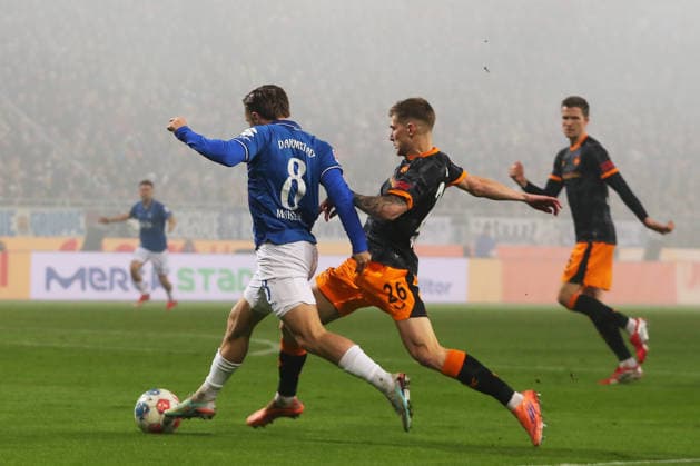 07 02 2026, xtvx, Fußball 2 Bundesliga, SV Darmstadt 98 1 FC Kaiserslautern v l Zweikampf, Duell, duel, tackle, compete Luca Marseiler SV Darmstadt 98 Paul Joly 1 FC Kaiserslautern der zur, Strafstoss fuehrt DFL DFB REGULATIONS PROHIBIT ANY USE OF PHOTOGRAPHS as IMAGE SEQUENCES and or QUASI VIDEO Darmstadt