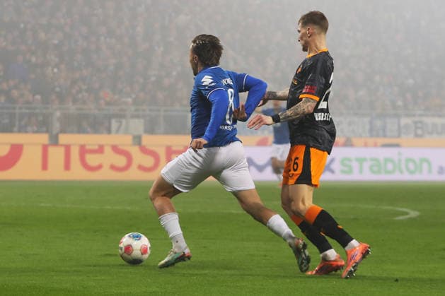 07 02 2026, xtvx, Fußball 2 Bundesliga, SV Darmstadt 98 1 FC Kaiserslautern v l Zweikampf, Duell, duel, tackle, compete Luca Marseiler SV Darmstadt 98 Paul Joly 1 FC Kaiserslautern der zur, Strafstoss fuehrt DFL DFB REGULATIONS PROHIBIT ANY USE OF PHOTOGRAPHS as IMAGE SEQUENCES and or QUASI VIDEO Darmstadt