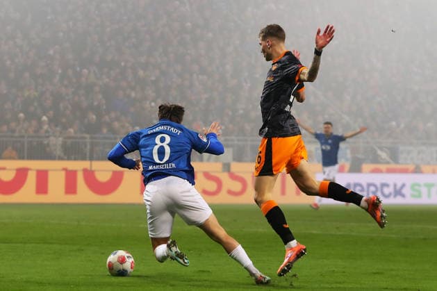 07 02 2026, xtvx, Fußball 2 Bundesliga, SV Darmstadt 98 1 FC Kaiserslautern v l Zweikampf, Duell, duel, tackle, compete Luca Marseiler SV Darmstadt 98 Paul Joly 1 FC Kaiserslautern der zur, Strafstoss fuehrt DFL DFB REGULATIONS PROHIBIT ANY USE OF PHOTOGRAPHS as IMAGE SEQUENCES and or QUASI VIDEO Darmstadt