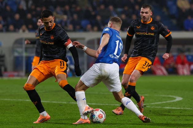 FBL Germany 2 Bundesliga SV Darmstadt 98 1 FC Kaiserslautern Kenny Redondo 1 FC Kaiserslautern , Fabian Nürnberger SV Darmstadt 98 battles for the Ball during the 2 Bundesliga 2025 26 match between SV Darmstadt 98 and 1 FC Kaiserslautern at Merckstadion am Böllenfalltor on 7 February 2026 in Darmstadt, Germany DFL DFB REGULATIONS PROHIBIT ANY USE OF PHOTOGRAPHS as IMAGE SEQUENCES and or QUASI VIDEO Copyright: JoaquimxFerreira