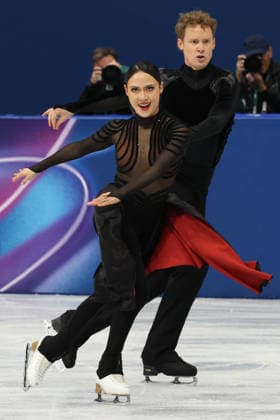 February 7, 2026, Milan, Lombardy, Italy: MADISON CHOCK and EVAN BATES of Team USA perform their Ice Dance Free Dance in the Figure skating, Eiskunstlauf Team Event at the Milano Cortina 2026 Winter Olympic Games, Olympische Spiele, Olympia, OS Olympics 2026: Milano Cortina: Figure Skating Team Event  - ZUMAc179 20260207_oly_c179_076 Copyright: xMickaelxChavetx