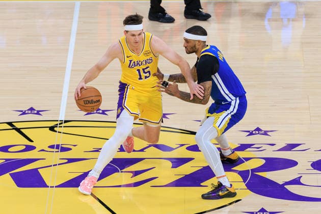 February 7, 2026, Los Angeles, California, USA: Austin Reaves 15 of the Los Angeles Lakers is guarded by Gary Payton II 0 of the Golden State Warriors during a regular season NBA, Basketball Herren, USA game on Saturday February 7, 2026 at Crypto.com Arena in Los Angeles, California. Lakers defet Warriors, 105-99. JAVIER ROJAS PI Los Angeles USA - ZUMAp124 20260207_zaa_p124_011 Copyright: xJavierxRojasx