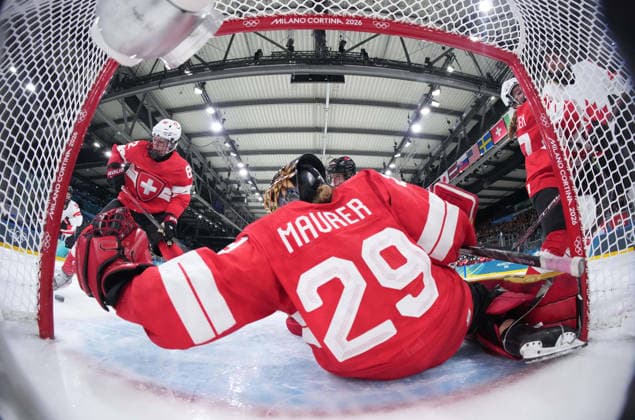 (260208) -- MILAN, Feb. 8, 2026 -- Goalkeeper Saskia Maurer (R) of Switzerland defends during the Ice hockey, Eishockey women s preliminary round group A match between Switzerland and Canada at the Milan-Cortina 2026 Olympic Winter games, Winterspiele,Spiele, Summer games in Milan, Italy, Feb. 7, 2026. ( Pool via Xinhua) (MICO2026)ITALY-MILAN-OLYMPIC WINTER GAMES-ICE HOCKEY-WOMEN-PRELIMINARY ROUND-SUI VS CAN TaoxXiyi 