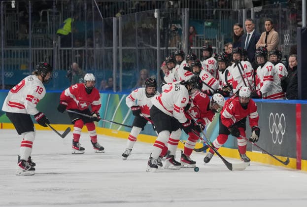 (260208) -- MILAN, Feb. 8, 2026 -- Sophie Jaques (4th L) of Canada vies with Leoni Balzer (5th L) of Switzerland during the Ice hockey, Eishockey women s preliminary round group A match between Switzerland and Canada at the Milan-Cortina 2026 Olympic Winter games, Winterspiele,Spiele, Summer games in Milan, Italy, Feb. 7, 2026. ) (MICO2026)ITALY-MILAN-OLYMPIC WINTER GAMES-ICE HOCKEY-WOMEN-PRELIMINARY ROUND-SUI VS CAN TaoxXiyi 