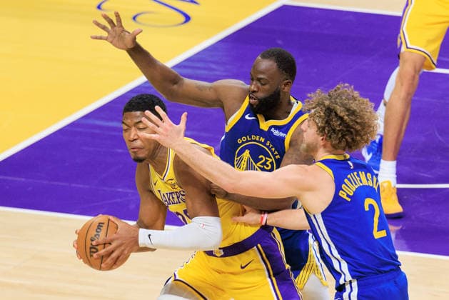 February 7, 2026, Los Angeles, California, USA: Rui Hachimura 28 of the Los Angeles Lakers tries to pass away from Draymond Green 23 and Brandin Podziemski 2 of the Golden State Warriors during a regular season NBA, Basketball Herren, USA game on Saturday February 7, 2026 at Crypto.com Arena in Los Angeles, California. Lakers defeat Warriors, 105-99. JAVIER ROJAS PI Los Angeles USA - ZUMAp124 20260207_zaa_p124_031 Copyright: xJavierxRojasx