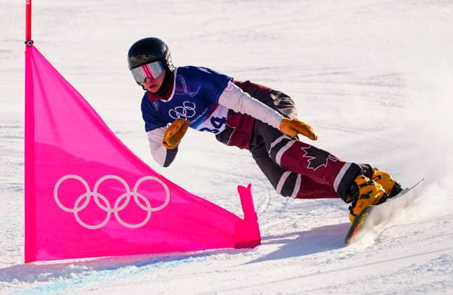 February 8, 2026, Livigno, Italy: Arnaud Gaudet, from Montcalm, Que., races in the men s parallel giant slalom qualification at the Milano Cortina 2026 Winter Olympic Games, Olympische Spiele, Olympia, OS in Livigno, Italy on Sunday, Feb. 8, 2026. Canada News - February 8, 2026  - ZUMAc35_ 20260208_zaf_c35_001 Copyright: xSeanxKilpatrickx