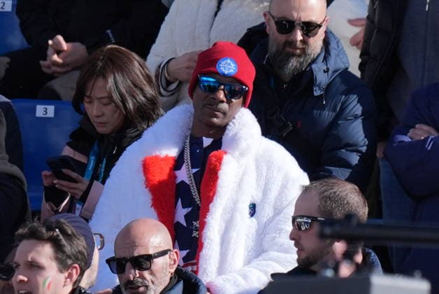 snoop dogg at the finish line of a women s downhill alpine skiing race at the 2026 Winter Olympics in Cortina, Italy, on Saturday, February 8, 2026.  Copyright: xDavidexSpada LaPressex