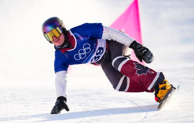 February 8, 2026, Livigno, Italy: Ben Heldman, from Toronto, Ont., races in the men s snowboarding parallel giant slalom qualification at the Milano Cortina 2026 Winter Olympic Games, Olympische Spiele, Olympia, OS in Livigno, Italy on Sunday, Feb. 8, 2026. Canada News - February 8, 2026  - ZUMAc35_ 20260208_zaf_c35_021 Copyright: xSeanxKilpatrickx