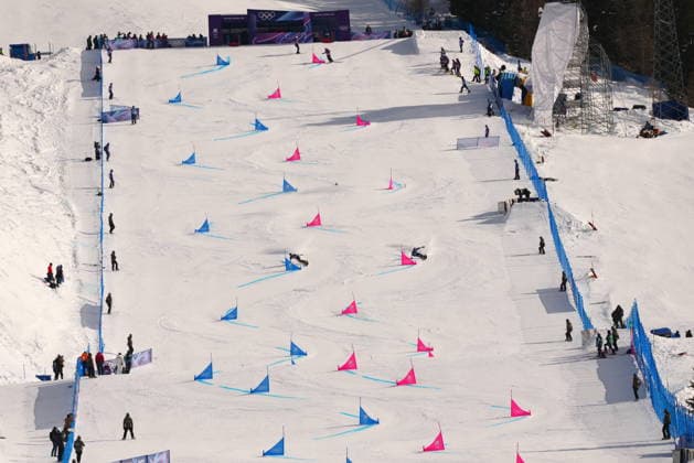 February 8, 2026, Livigno, Italy: Arnaud Gaudet, from Montcalm, Que., left, competes in the men s snowboarding parallel giant slalom 1 8 finals against against Bulgaria s Radoslav Yankov at the 2026 Winter Olympics, in Livigno, Italy, Sunday, Feb. 8, 2026. Canada News - February 8, 2026  - ZUMAc35_ 20260208_zaf_c35_032 Copyright: xSeanxKilpatrickx