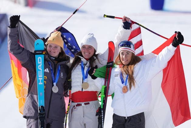 Brezy Jhonson (gold), Emma Aicher (silver) and Sofia Goggia (bronze) at the finish line of a women s downhill alpine skiing race at the 2026 Winter Olympics in Cortina, Italy, on Saturday, February 8, 2026.  Copyright: xDavidexSpada LaPressex