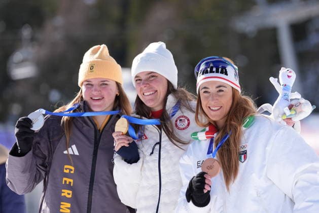Brezy Jhonson (gold), Emma Aicher (silver) and Sofia Goggia (bronze) at the finish line of a women s downhill alpine skiing race at the 2026 Winter Olympics in Cortina, Italy, on Saturday, February 8, 2026.  Copyright: xDavidexSpada LaPressex