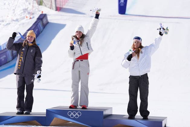Brezy Jhonson (gold), Emma Aicher (silver) and Sofia Goggia (bronze) at the finish line of a women s downhill alpine skiing race at the 2026 Winter Olympics in Cortina, Italy, on Saturday, February 8, 2026.  Copyright: xDavidexSpada LaPressex