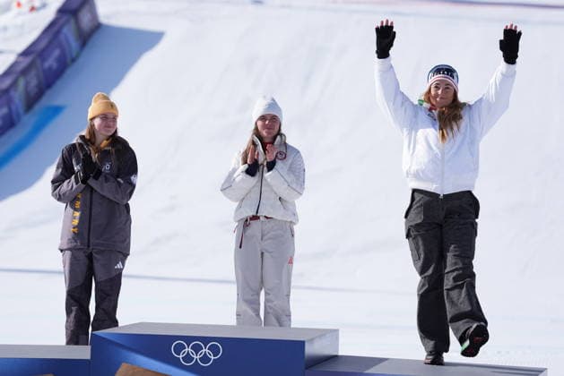 Brezy Jhonson (gold), Emma Aicher (silver) and Sofia Goggia (bronze) at the finish line of a women s downhill alpine skiing race at the 2026 Winter Olympics in Cortina, Italy, on Saturday, February 8, 2026.  Copyright: xDavidexSpada LaPressex