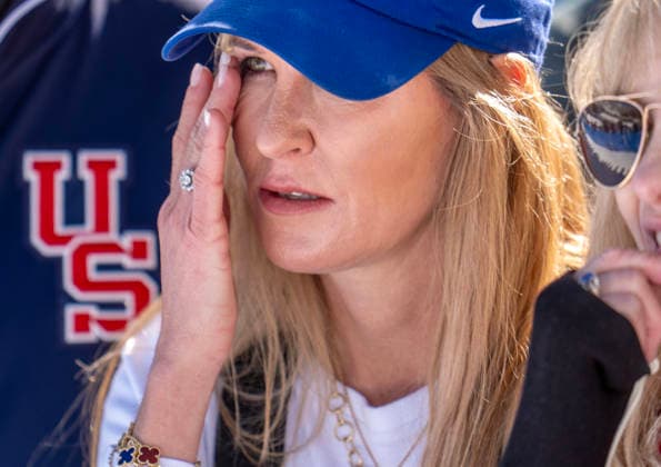 February 8, 2026, Cortina D ampezzo, Belluno, Italy: A USA fan wipes tears from her eyes as the Lindsey Vonn fall high on the Alpine Skiing womenÃ¢â‚¬â ¢s downhill screen plays Sunday on the Tofane Alpine course during the 2026 Winter Olympics at the Tofane Alpine Skiing Centre on Sunday in Cortina d Ampezzo. Cortina D ampezzo Italy - ZUMAa35_ 20260208_oly_a35_001 Copyright: xDanielxA.xAndersonx