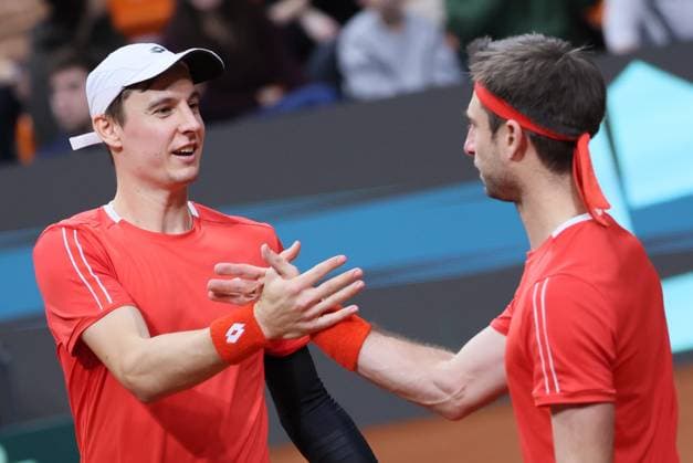 Belgian Joran Vliegen and Belgian Sander Gille celebrate after winning a doubles tennis match against Bulgarian pair Donski Nesterov, match 3 of the qualifier of the Davis Cup on Sunday 08 February 2026, in Plovdiv, Bulgaria. Belgium will compete this weekend in the Davis Cup qualifiers against Bulgaria. BENOITxDOPPAGNE  x161947540x