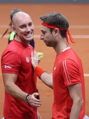 Belgian captain Steve Darcis and Belgian Sander Gille celebrate after winning a doubles tennis match between Bulgarian Donski Nesterov and Belgian Gille Vliegen, match 3 of the qualifier of the Davis Cup on Sunday 08 February 2026, in Plovdiv, Bulgaria. Belgium will compete this weekend in the Davis Cup qualifiers against Bulgaria. BENOITxDOPPAGNE  x161948824x