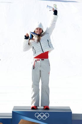 USA s Breezy Johnson celebrates her gold medal in the Women s downhill race at the 2026 Winter Olympics in Cortina, Italy on Sunday February 08, 2026. Germany s Emma Aicher won the Silver and Italy s Sofia Goggia won the bronze medal. USA s Lndsey Vonn crashed at the top of the course and was airlifted to hospital.  OLY2026020803 HUGOxPHILPOTT
