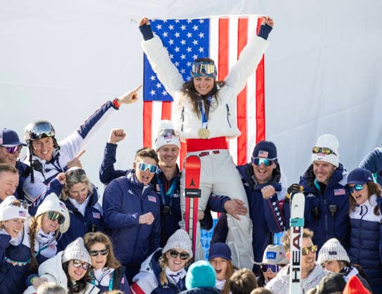 February 8, 2026, Cortina D ampezzo, Lombardy, Italy: Breezy Johnson of the United States celebrates with USA Ski Team members and coaches after winning gold in the Womens Downhill at Tofane Alpine Skiing Centre for the Milano Cortina 2026 Winter Olympics. Olympics 2026: Milano Cortina: Alpine Skiing: Women S  - ZUMAsc5_ 20260208_oly_sc5_002 Copyright: xErichxSchlegelx