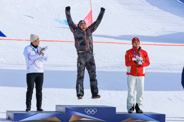OLYMPICS - Winter Olympic Games, Olympische Spiele, Olympia, OS Milano Cortina 2026 LIVIGNO,ITALY,08.FEB.26 - OLYMPICS, SNOWBOARD - Winter Olympic Games Milano Cortina 2026, Parallel Giant Slalom, final, women, men. Image shows the rejoicing of Sangkyum Kim (KOR), Benjamin Karl (AUT) and Tervel Zamfirov (BUL). keywords: award ceremony.  GEPAxpictures xWolfgangxGrebien