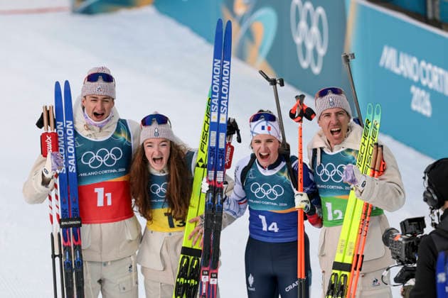OLYMPICS - Winter Olympic Games, Olympische Spiele, Olympia, OS Milano Cortina 2026 ANTHOLZ,ITALY,08.FEB.26 - OLYMPICS, BIATHLON - Winter Olympic Games Milano Cortina 2026, mixed relay, 4x6km. Image shows the rejoicing of Eric Perrot, Lou Jeanmonnot, Julia Simon and Quentin Fillon Maillet (FRA)  GEPAxpictures xMatthiasxTrinkl