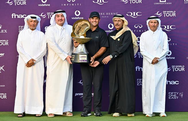 Qatar Masters 2026 - Day Four Patrick Reed of the United States poses with the trophy alongside officials after winning on day four of the Qatar Masters 2026 golf tournament at the Doha Golf Club in Doha, Qatar, on February 8, 2026. Doha Qatar Copyright: xNOUSHADx 776441069