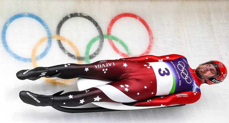 ITALY - FEBRUARY 8, 2026: Kristers Aparjods of Latvia competes in Run 3 in men s singles luge event at Cortina Sliding Centre in Cortina dâ€™Ampezzo during the 2026 Winter Olympic Games, Olympische Spiele, Olympia, OS Peter Kovalev TASS  88393287