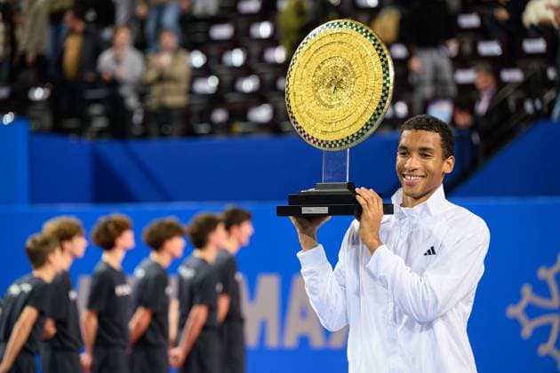 February 8, 2026, Perols, Montpellier, Occitanie, France: Felix Auger-Aliassime of Canada lifts his trophy after his match against Adrian Mannarino of France at Open Occitanie on February 8, 2026, at Sud de France Arena in Montpellier, France. Tennis 2026: Open Occitanie  - ZUMAc313 20260208_zsp_c313_001 Copyright: xFaresxChafaix