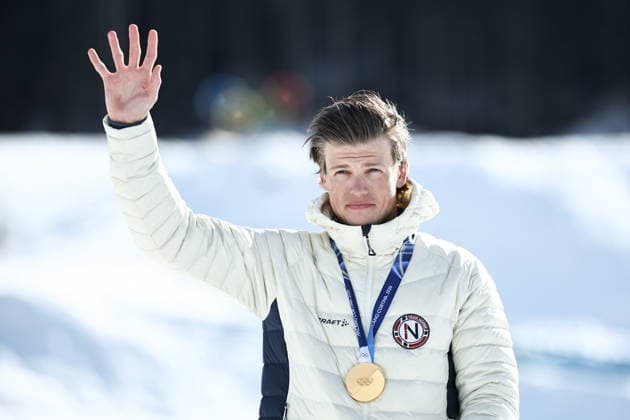 ITALY - FEBRUARY 8, 2026: Gold medal winner Johannes Hoesflot Klaebo of Norway celebrates during the victory ceremony for the men s 10km+10km skiathlon at Tesero Cross-Country Stadium during the 2026 Winter Olympic Games, Olympische Spiele, Olympia, OS Mikhail Tereshchenko TASS  88393950