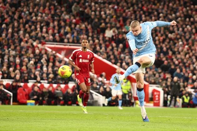 Erling Haaland of Manchester City shoots Liverpool v Manchester City, Premier League, Football, Anfield, Liverpool, UK - 08 Feb 2026Liverpool Anfield United Kingdom EDITORIAL USE ONLY No use with unauthorised audio, video, data, fixture lists, club league logos or live services. Online in-match use limited to 120 images, no video emulation. No use in betting, games or single club league player publications. Copyright: xRyanxBrowne Shutterstockx 16524446am