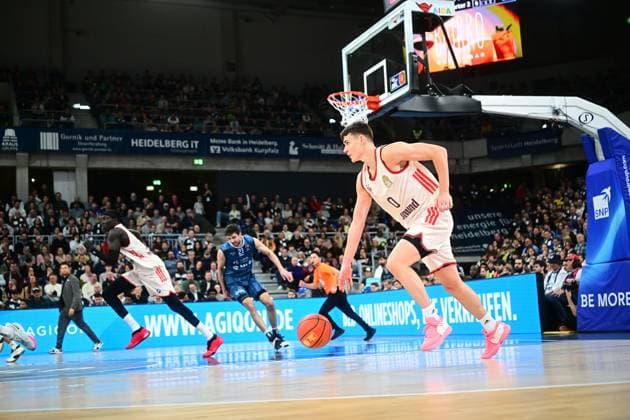 Game action with Neno Dimitrijevic 0 FC Bayern Basketball and Mateo Seric 21 MLP Academics Heidelberg on the pitch easyCredit BBL MLP Academics Heidelberg - FC Bayern Munich Basketball 08 02 2026 Copyright: xMichaelxGelhardtx
