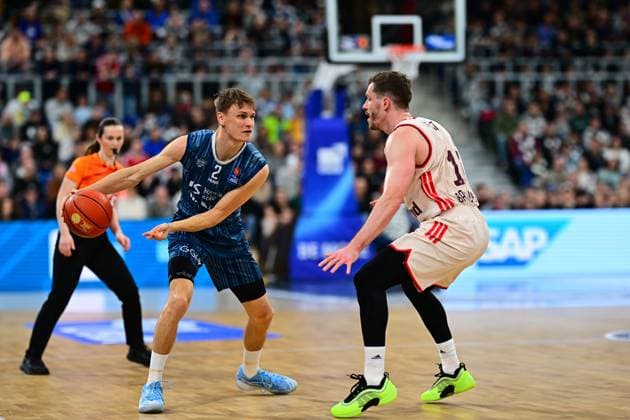 Game action with Andreas Obst 13 FC Bayern Basketball and Niklas Würzner 2 MLP Academics Heidelberg easyCredit BBL MLP Academics Heidelberg - FC Bayern Munich Basketball 08 02 2026 Copyright: xMichaelxGelhardtx