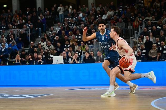Scene with Vladimir Lucic 11 FC Bayern Basketball and Erol Ersek 11 MLP Academics Heidelberg in action easyCredit BBL MLP Academics Heidelberg - FC Bayern Munich Basketball 08 02 2026 Copyright: xMichaelxGelhardtx