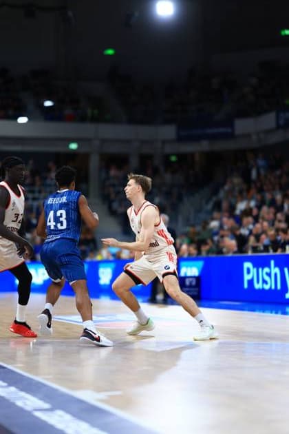Scene with Vladimir Lucic 11 FC Bayern Basketball and Eric Reed Jr 43 MLP Academics Heidelberg in defense and offense easyCredit BBL MLP Academics Heidelberg - FC Bayern Munich Basketball 08 02 2026 Copyright: xMichaelxGelhardtx