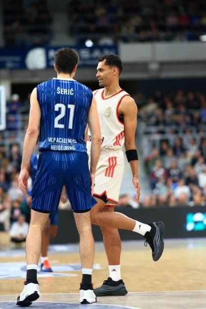 Scene with Justus Hollatz 21 FC Bayern Basketball and Noah Koch 1 MLP Academics Heidelberg in a defensive situation easyCredit BBL MLP Academics Heidelberg - FC Bayern Munich Basketball 08 02 2026 Copyright: xMichaelxGelhardtx
