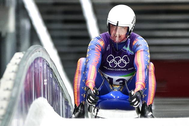 ITALY - FEBRUARY 8, 2026: Valentin Cretu of Romania competes in Run 4 of the men s singles luge event at Cortina Sliding Centre in Cortina dâ€™Ampezzo during the 2026 Winter Olympic Games, Olympische Spiele, Olympia, OS Peter Kovalev TASS  88398640