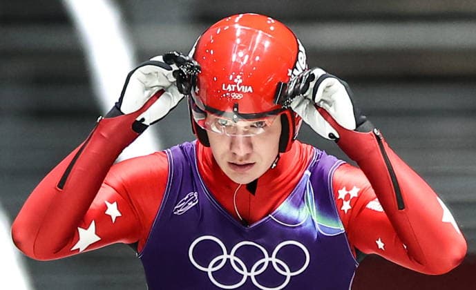 ITALY - FEBRUARY 8, 2026: Gints Berzins of Latvia competes in Run 4 of the men s singles luge event at Cortina Sliding Centre in Cortina dâ€™Ampezzo during the 2026 Winter Olympic Games, Olympische Spiele, Olympia, OS Peter Kovalev TASS  88398863